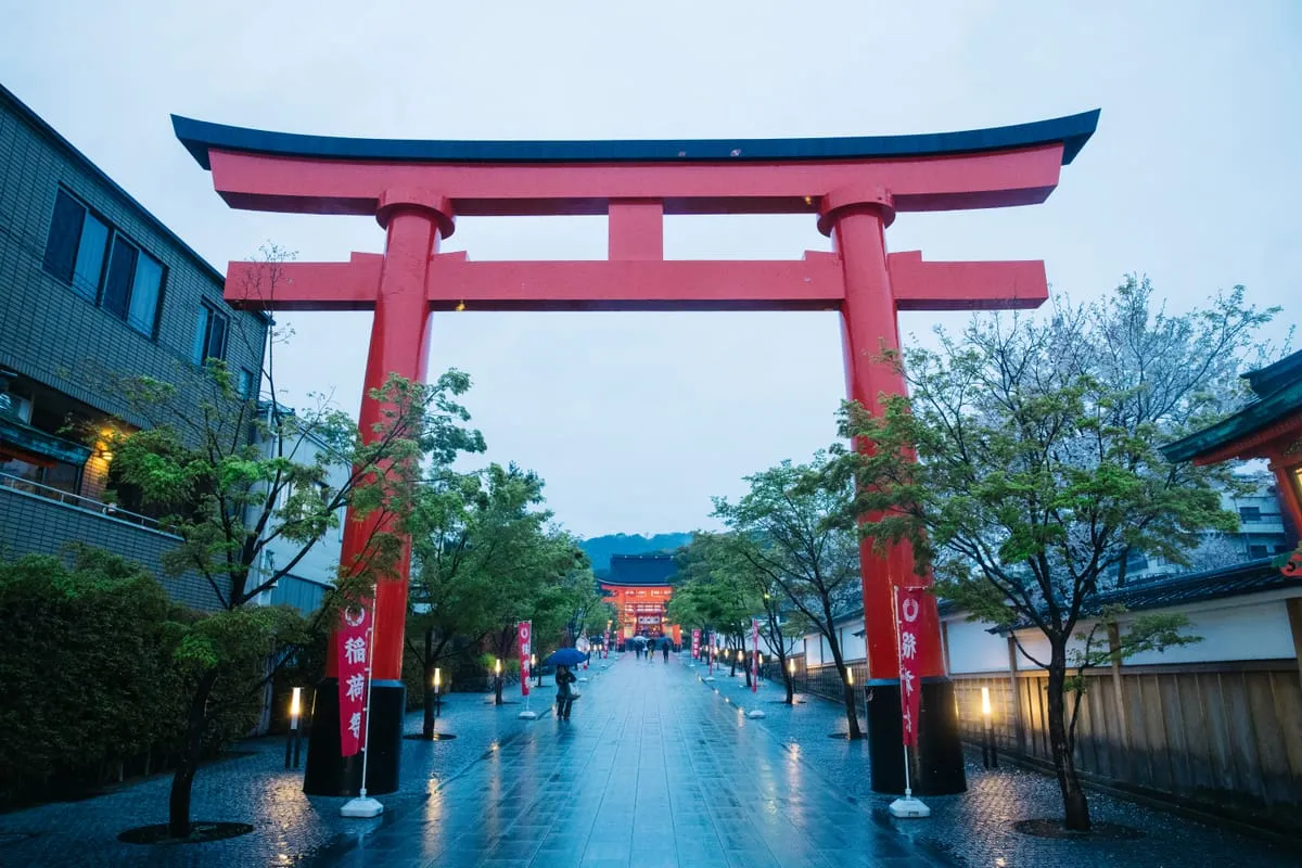 Torii gate in rain at Fushimi Inari Grand Shrine, Kyoto
