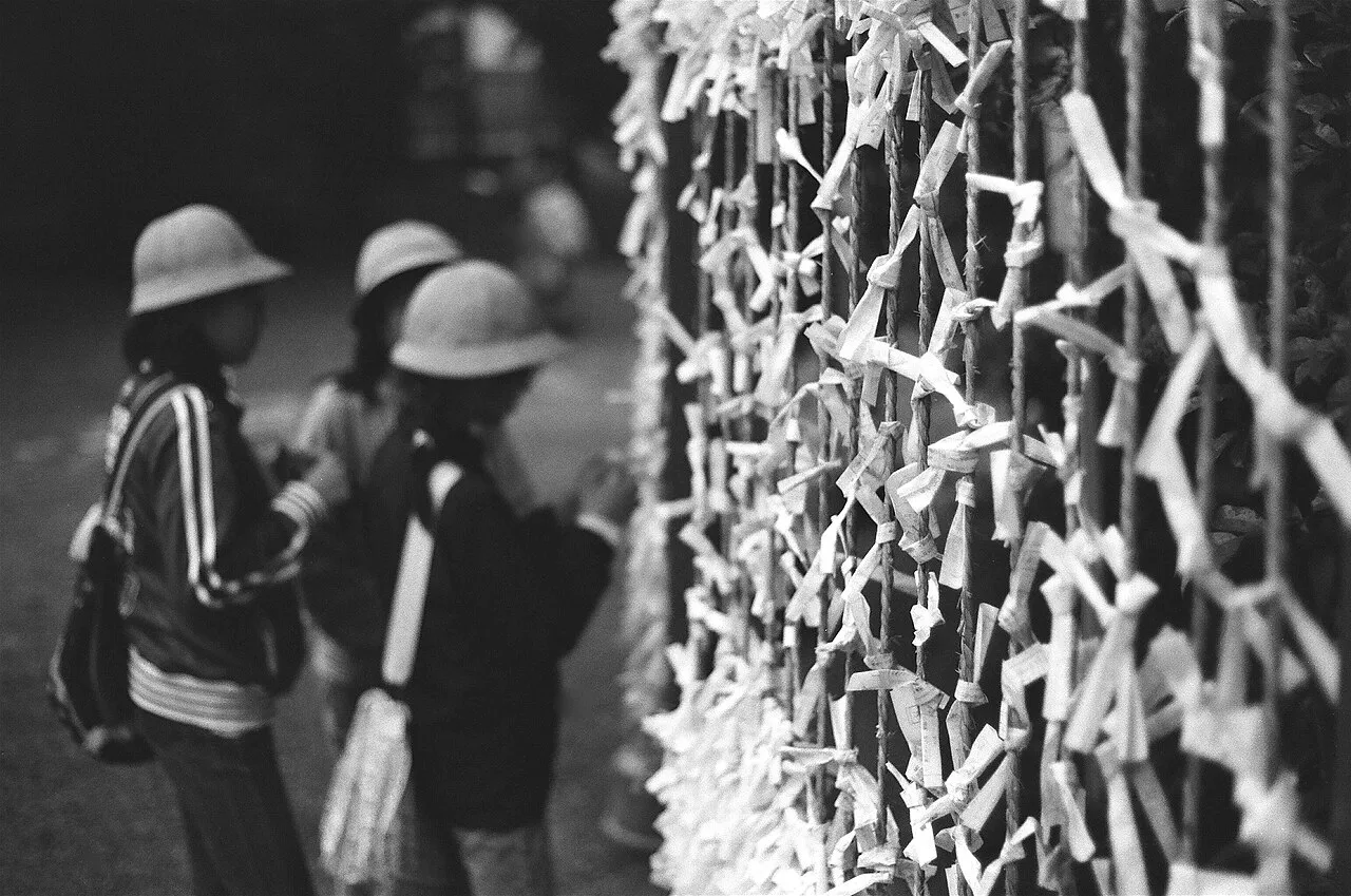Fortune slips tied to strings at Tsurugaoka Hachimangu shrine